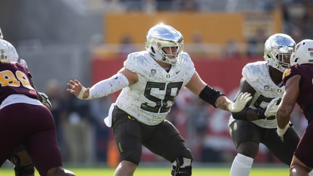 Nov 18, 2023; Tempe, Arizona, USA; Oregon Ducks offensive lineman Jackson Powers-Johnson (58) against the Arizona State Sun Devils at Mountain America Stadium. Mandatory Credit: Mark J. Rebilas-USA TODAY Sports  